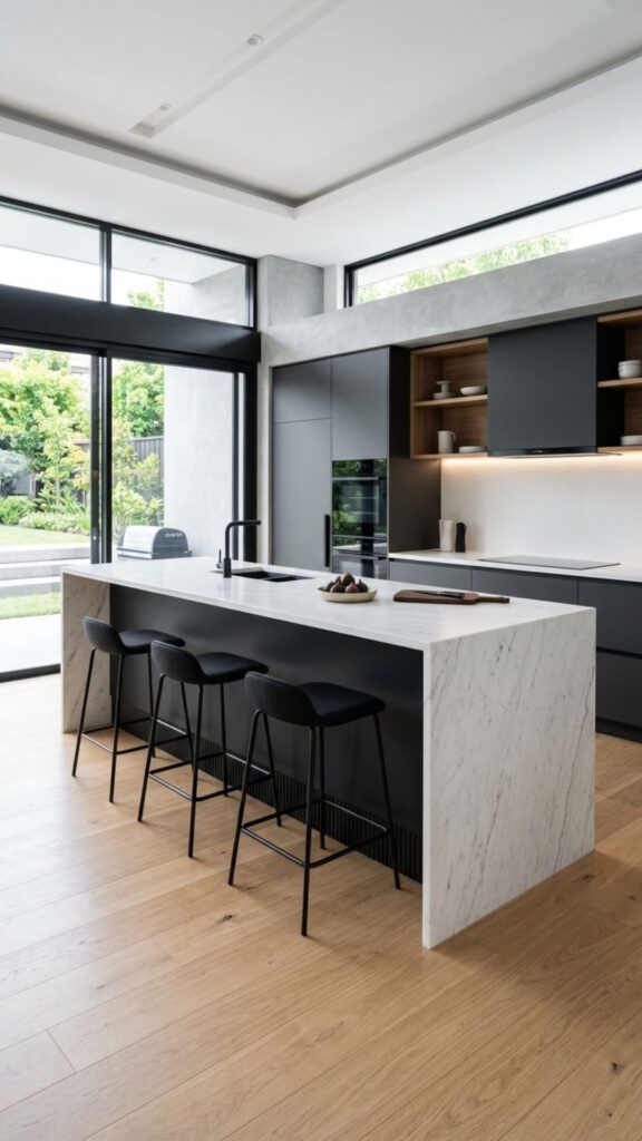 1. Matte Black Island with Waterfall Countertop